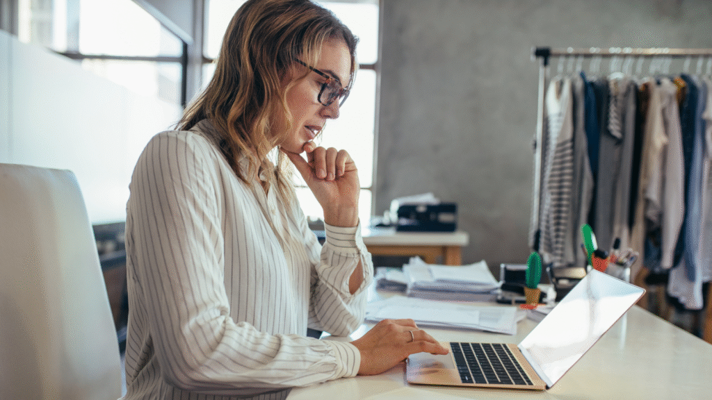 business owner working on her laptop